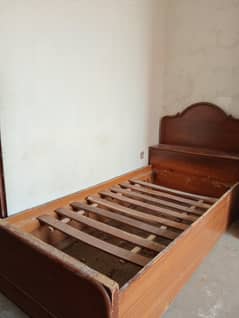 wooden single bed