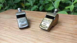 vintage 1960s pair brass whistles