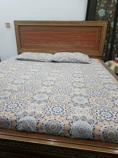Wooden double bed for sale
