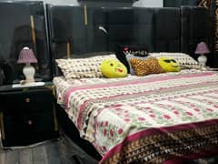 Bed with side tables