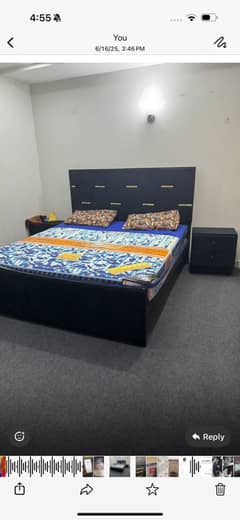 Bed with side tables