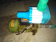 Monoblock motor with pressure pump switch