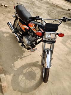 Honda 125 number lga hwa hn cd 70 k sth exchange BHI krlo ga