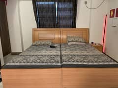 Twin bed set with chester and side table