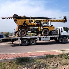Lowering & pile sizes. 12" to 60" Pile Drilling of water bore