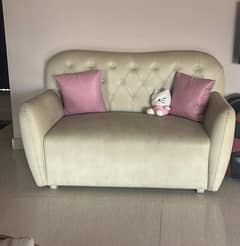 Ivory leatherite sofa