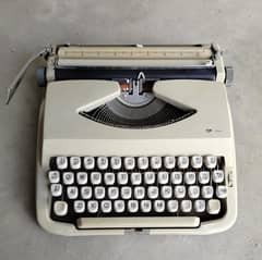 Typewriter portable - TIP 1100