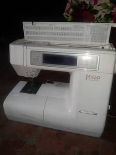 Janome 8200 sewing and embroidery machine.