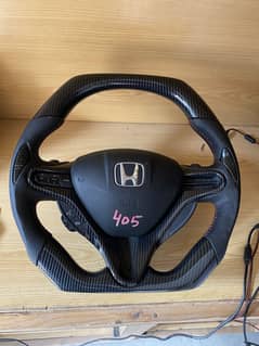 Multi media carbon steering for All cars