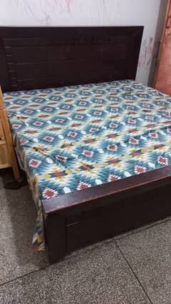 Wooden bed used