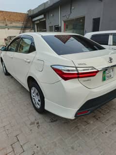 XLI