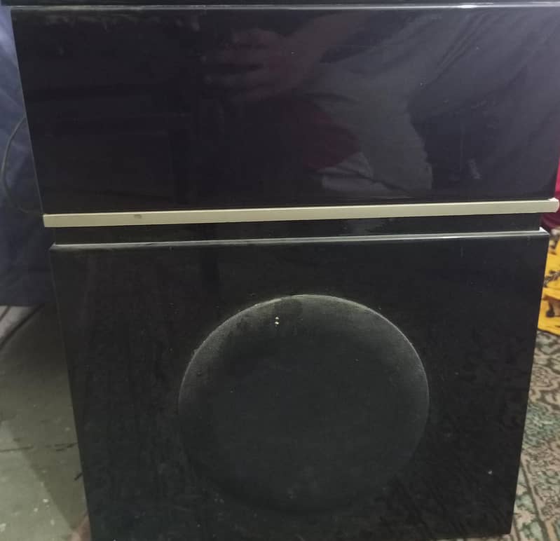 2.1 Home Sound System with built-in amplifiers and speakers. 3