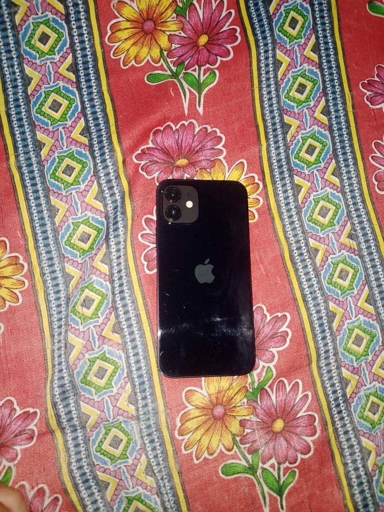 iPhone 12 10/10 condition . Come inbox or WhatsApp 0