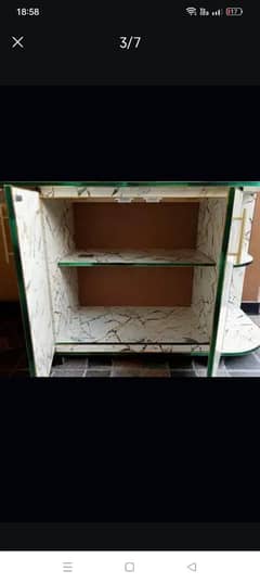 Ironing table with foldable top