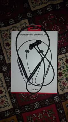 One plus bullets z2 anc box opened new