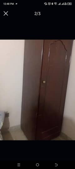 single wood cupboard used in condition