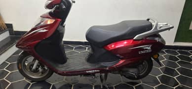 united scooty 100 cc petrol