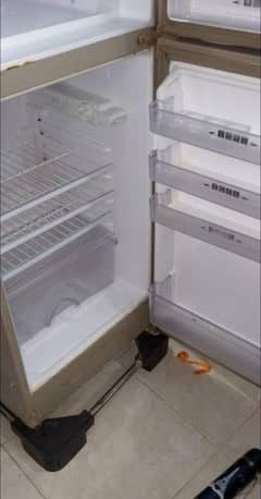 Double door used refrigerator in working condition. .