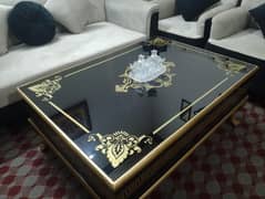 Luxury Black Glass Coffee Table with Golden Floral Detailing