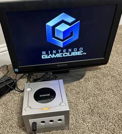Silver Nintendo Gamecube Console.