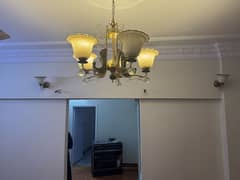 1 chandelier with 4 single wall lights