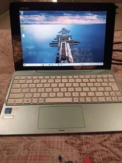 Asus T100 han Intel 1.9 Ghz quadcore