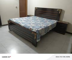 Double bed with side table