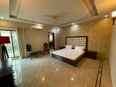 2 KANAL FULLY FURNISHED LAVISH BUNGALOW AVAILABLE FOR RENT AT VERY HOT LOCATION IN DHA LAHORE