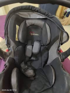 tinnies carry cot