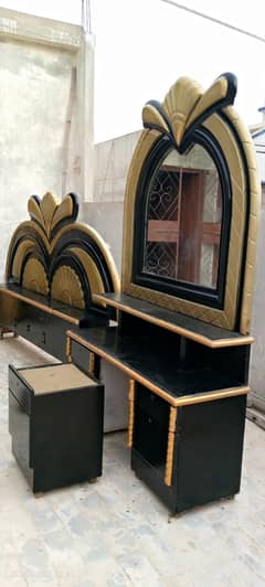 Double bed and Dressing table .