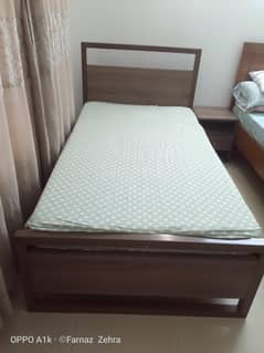 Single bed with side table