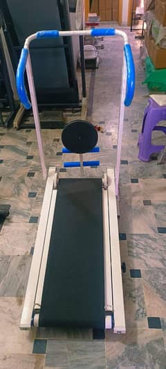 manual treadmill with rollers and twister exercise machine box packed