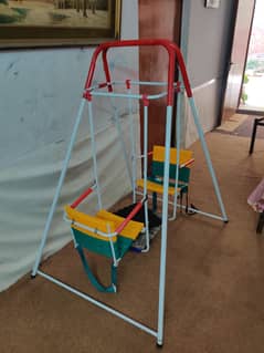 For Sale:  Kids Double Swing Set  Sturdy and colorful indoor swing