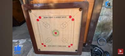 Carrom board and Dabbu