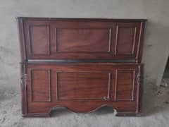 2 single wooden Beds