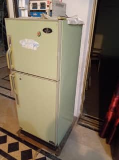 Dawlance company fridge for sale  small size. . runing and ok condion