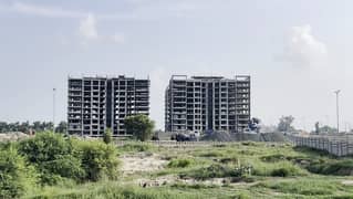 4 Marla All Paid Commercial Plot Zone 2--181 For Sale Located In The Best Block Of DHA Lahore.