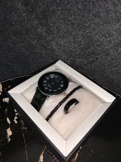 Quartz black leather watch with bracelet and ring