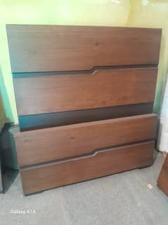 two bed with side table