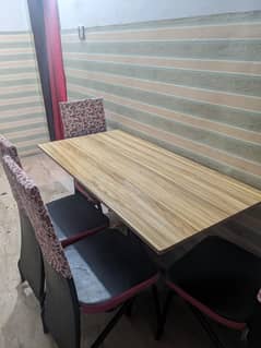 dinning table with four chairs