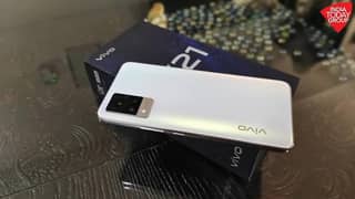V21 With Box Official PTA Original Charger condition 10.9 like new