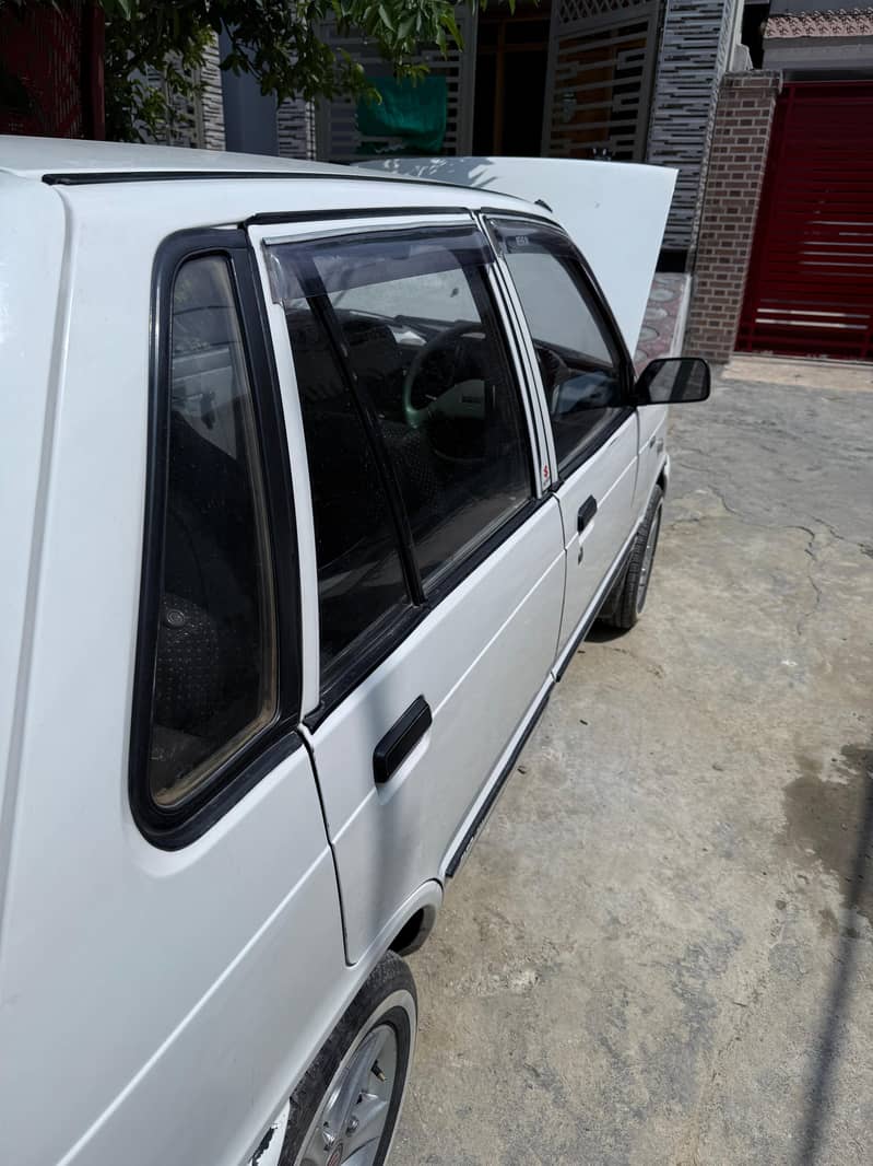 2018 model mehran vx  converted to vxr ac installed 1 piece touching 2