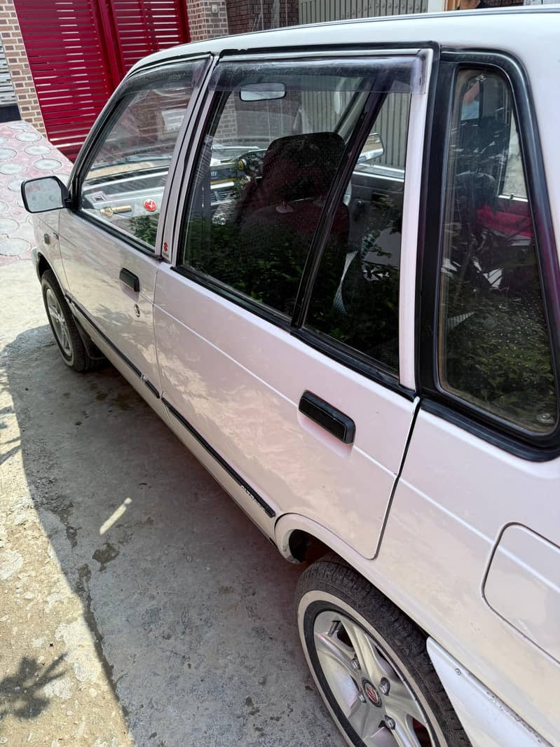 2018 model mehran vx  converted to vxr ac installed 1 piece touching 3