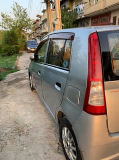 Daihatsu Mira 4 door