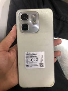 infinix hot 50i condition 10/9 6/128 with genuine box and charher