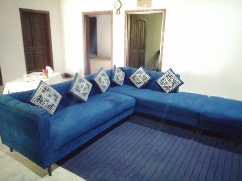 L shaped sofa with tables 2