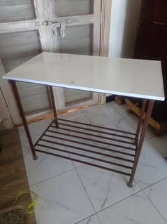 iron table with aluminum white sheet
