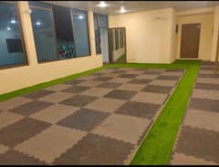 Interlocking floor mat sheet
