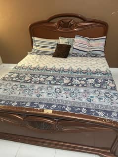 Wooden bed for sale at very cheap price