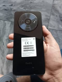 Redmi A3 with box and original charger 10 by 10 condition 4/64